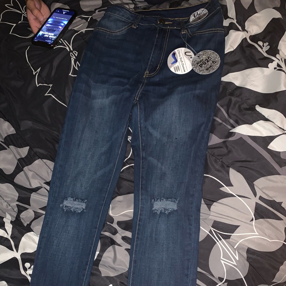 High waisted dark skinny jeans.